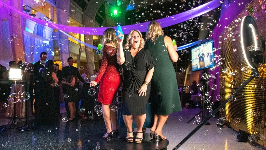 360 spinning camera booth operating at a formal gala event
