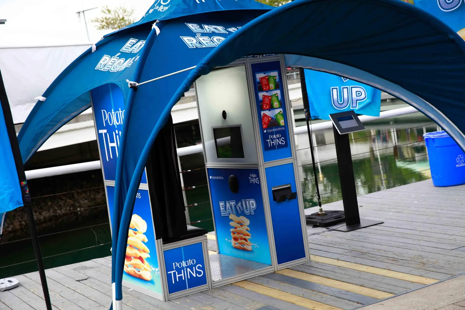 Brand activation photo booth structure at an outdoor corporate event