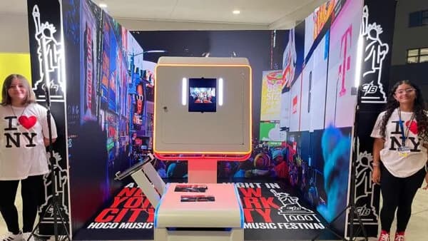 Branded photo booth used for experiential marketing at a public event
