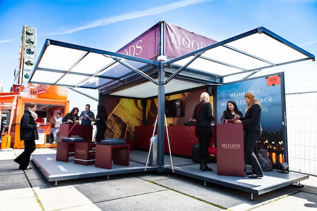 Guests using a branded corporate photo experience at a company event