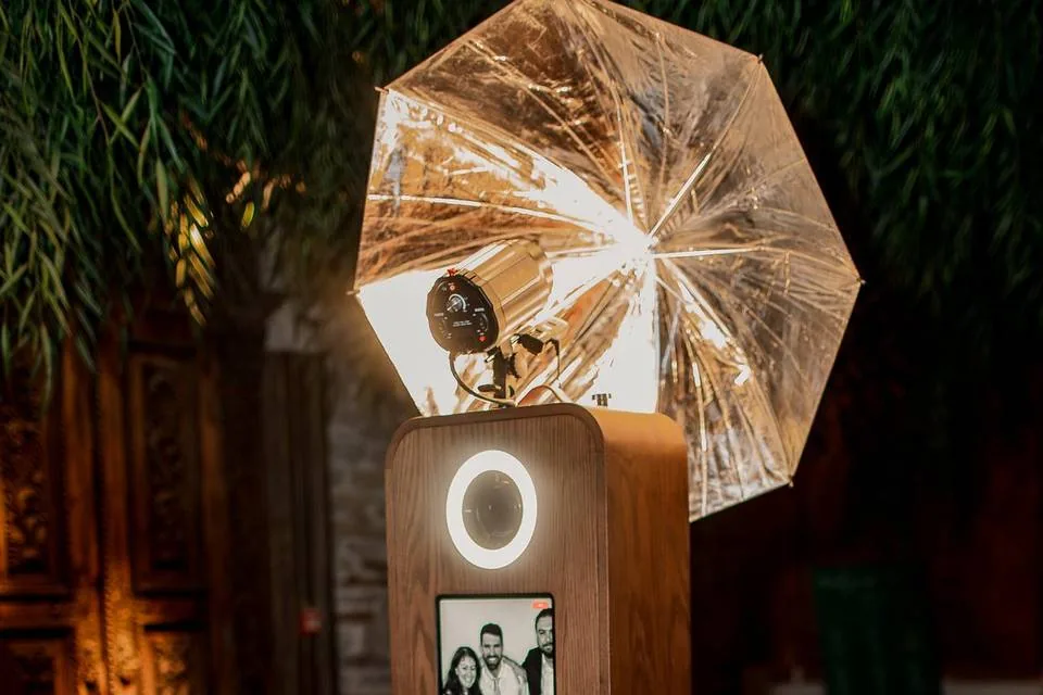 Guests posing for a Glambot camera at a red carpet event