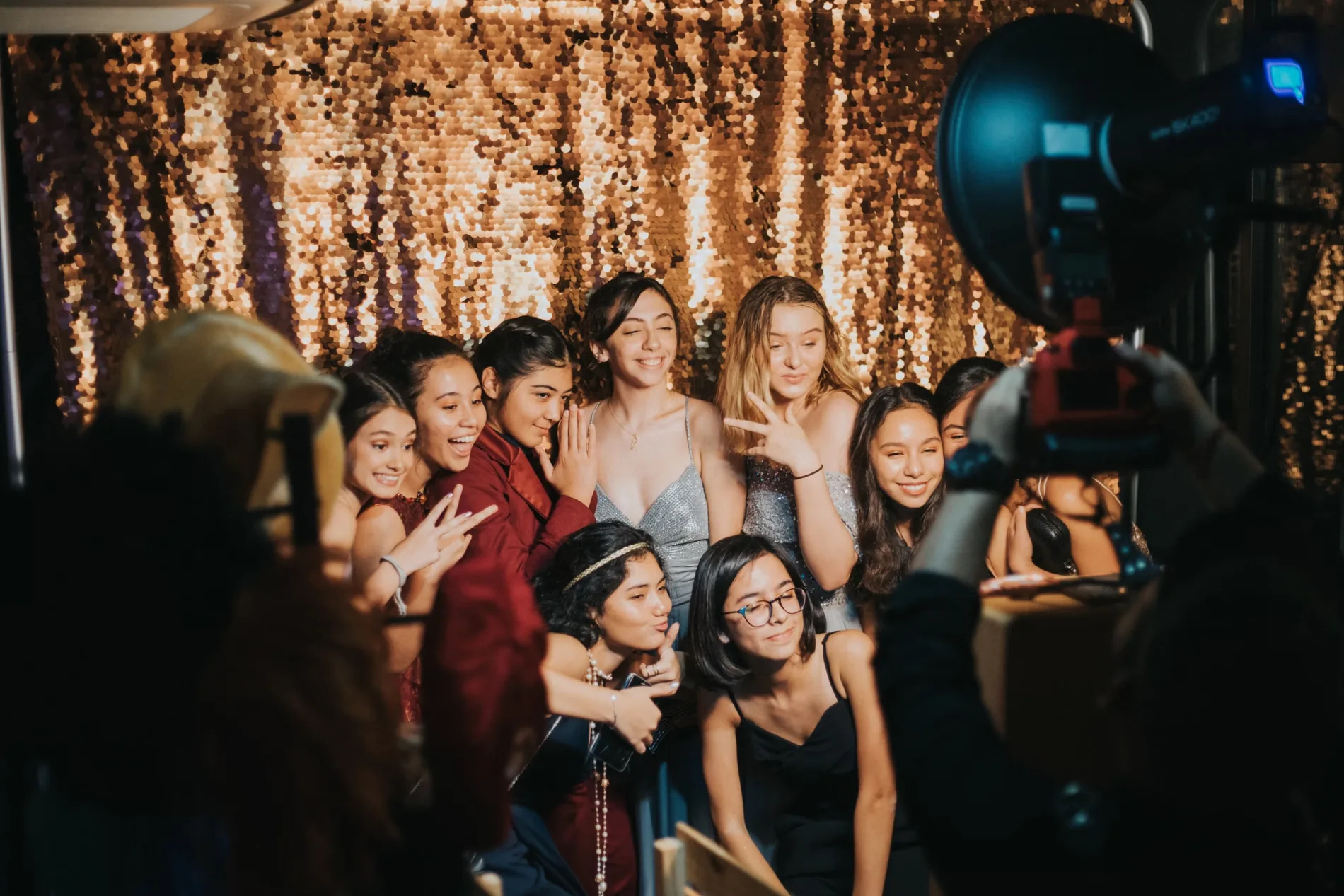 Guests posing together at a PhotoxUSA photo booth during a Chicago event