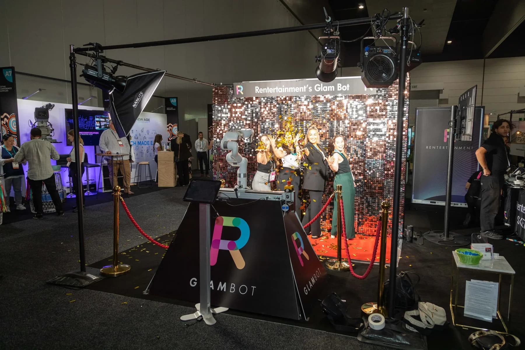 Glambot setup with LED lighting and mirror booth styling at an event venue