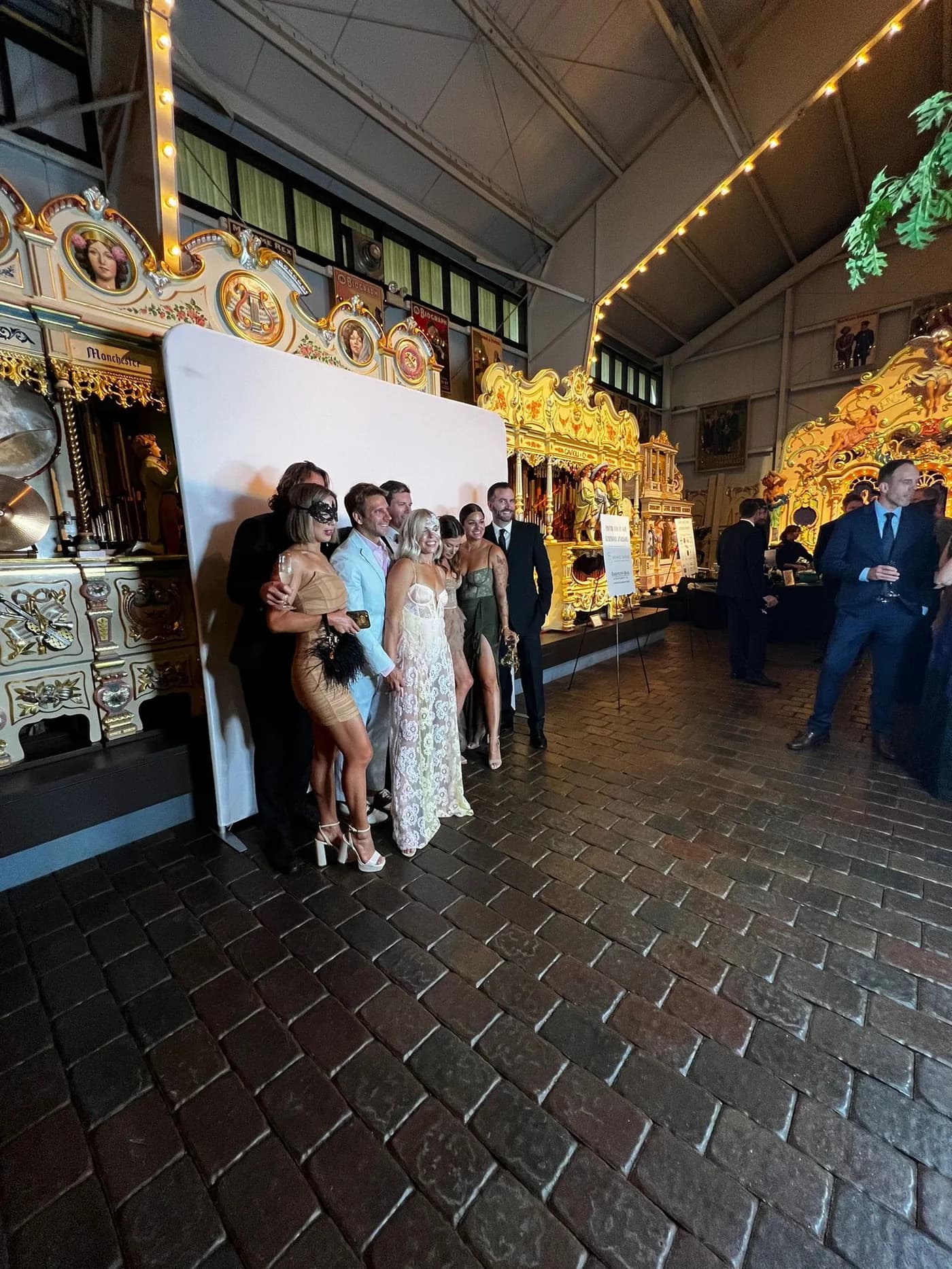 Wedding reception photo booth backdrop set up at a venue